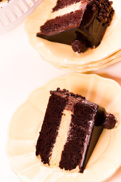 Salted caramel truffle torte with layers of chocolate cake filled with salted caramel mousse, covered in chocolate.