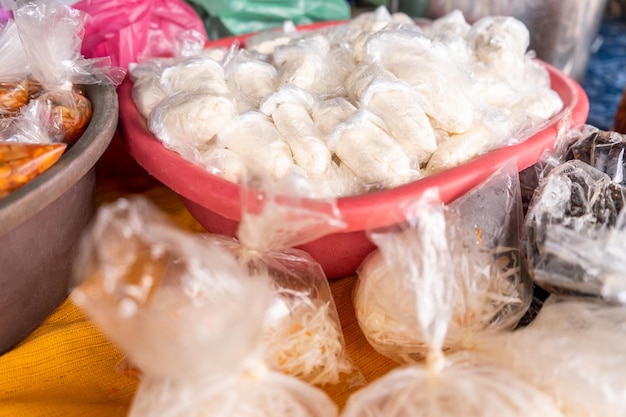 Salted curds packed in bags in a traditional Latin American retail store