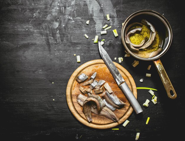 Salted herring with spices and herbs