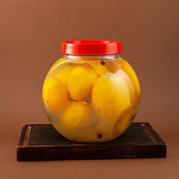 Salted lemons in jar Healthy fermented food Country lemon Moroccan cuisine