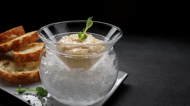 Salted pike caviar on ice with toast