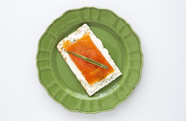 Salty crackers with salmon and cheese from above