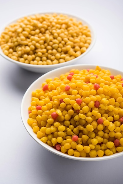 Salty or Kara Boondi or khari Bundi - A traditional Indian namkeen or snack and important Chat item, Served in a plate or bowl. selective focus