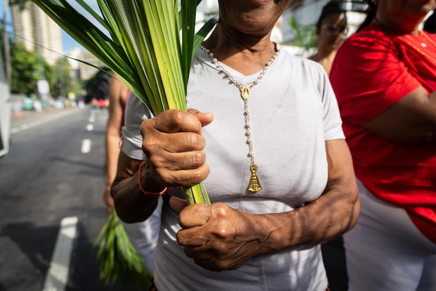 Salvador Bahia Brazil Abril 02 2023 Catholic worshipers hold palm branches for Palm Sunday mass in Salvador Bahia