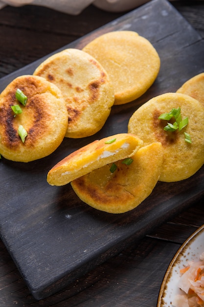 Salvadoran pupusa served with curtido