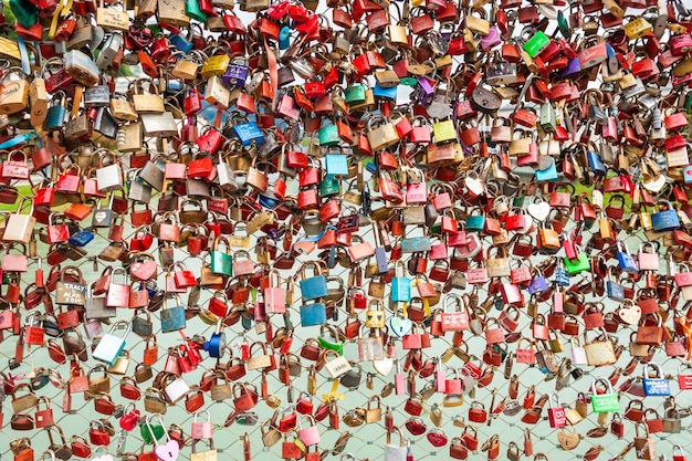 Salzburg, Austria - October, 1, 2017: Love red locks on the bridge