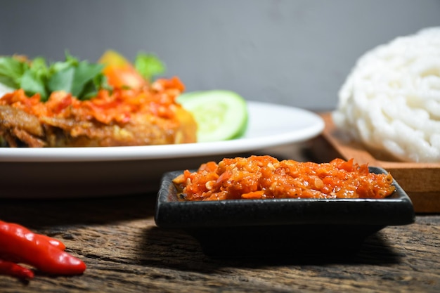 Sambal hot chili sauce is a spicy indonesian traditional food with ingredients red chili