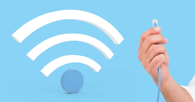 Samengesteld beeld van Hand met kabel en digitaal wifi-symbool