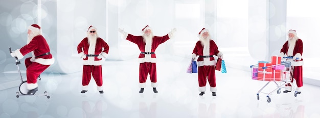 Samengesteld beeld van verschillende kerstmannen tegen lichtjes die fonkelen in een moderne kamer