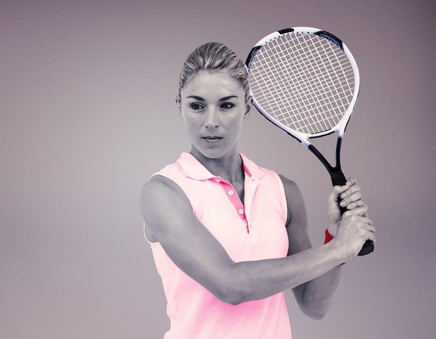 Samengestelde afbeelding van atleet die tennis speelt met een racket