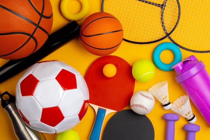 Foto samenstelling van diverse sportartikelen voor fitness en spel