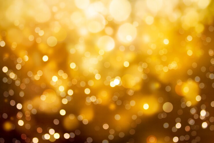 Foto samenvatting vage gouden kleuren bokeh achtergrond.
