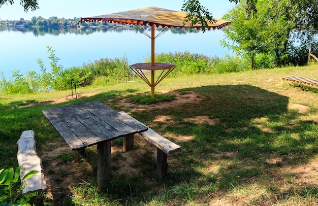 Samping pitch on summer lake calm beach