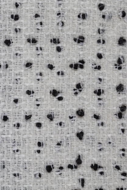 образец серой и белой полиэфирной ткани фоновой текстуры