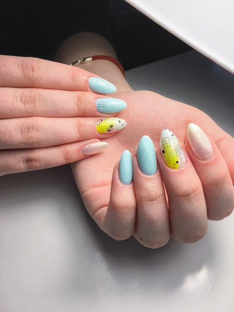 Sample of nail design on female hands.