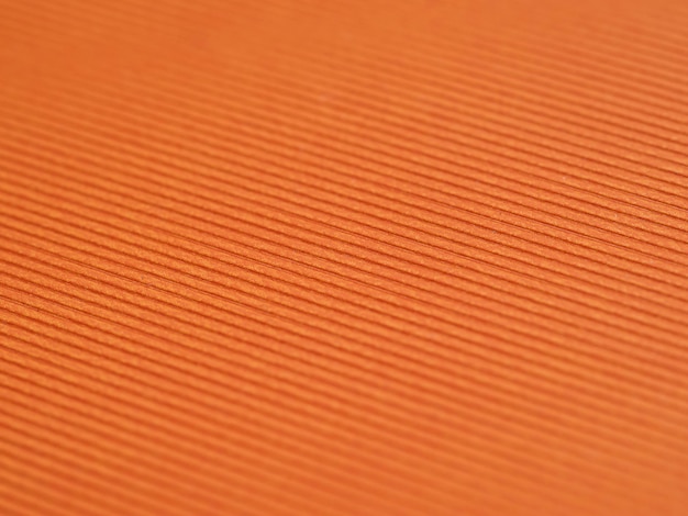 Sample of orange structured craft paper close-up