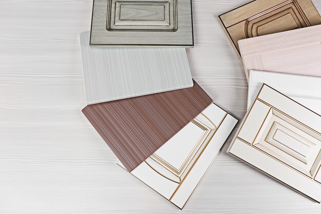 Photo samples of wooden panels for furniture and door on light table