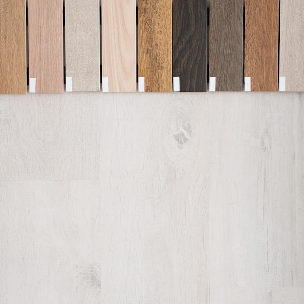 Samples of wooden skirting boards for different types of
floors. interior design. repair and construction of the house.