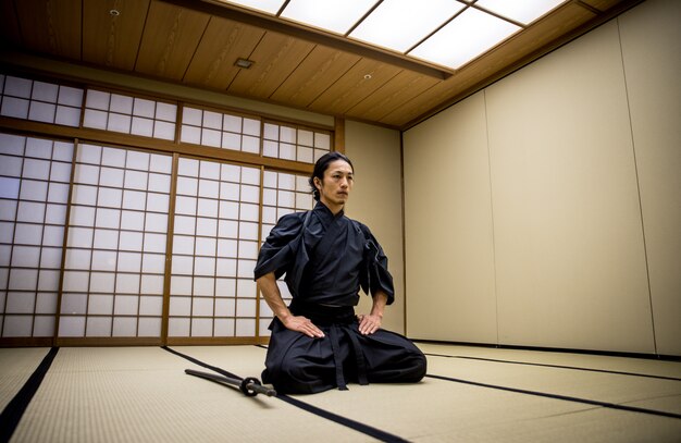 Samurai training in a traditional dojo, in Tokyo