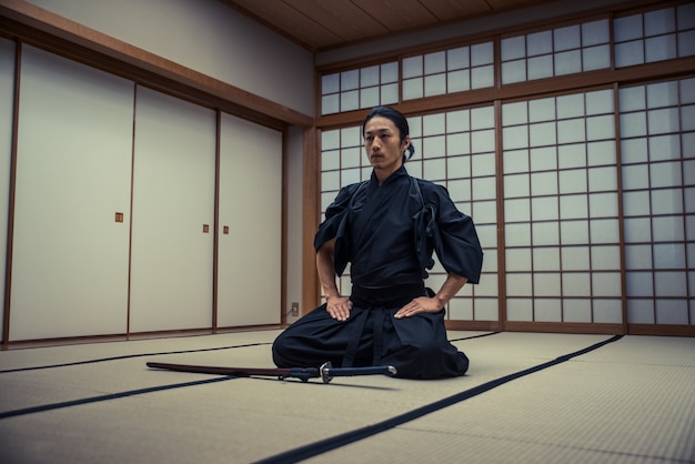 Samurai training in a traditional dojo, in Tokyo