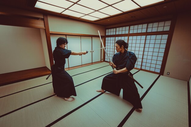 Samurai training in a traditional dojo, in Tokyo