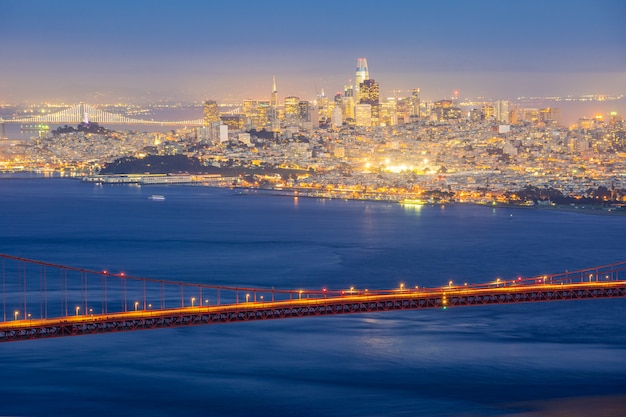 San Francisco cityscape with Golden Gate bridge at night