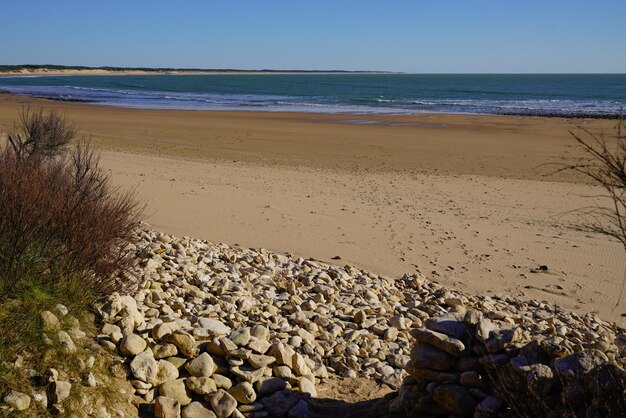 Sand beach access in low tide in talmont saint hilaire vendee France