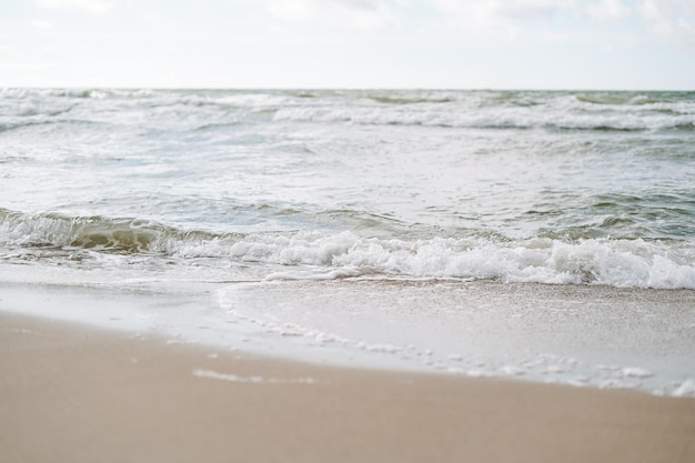 Sand beach on baltic sea in a storm