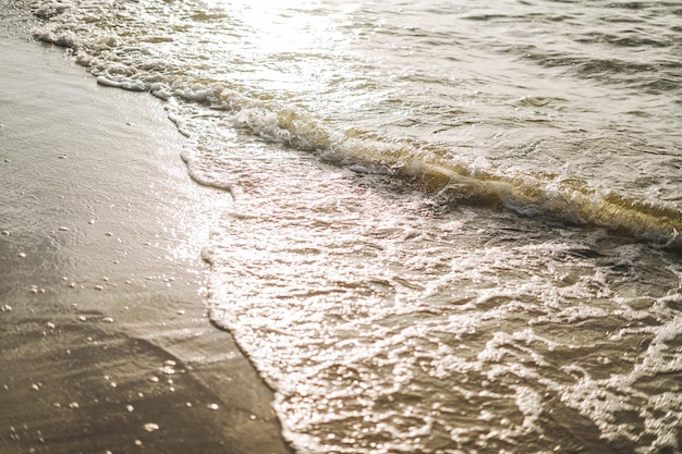 Sand beach on Baltic sea at sunset time