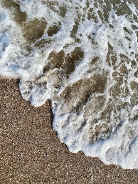 Sand on the beach is tan