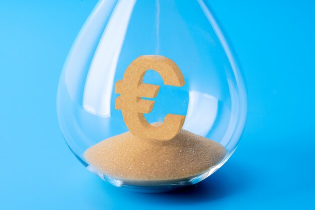 Photo sand clock for business concept and currency exchange