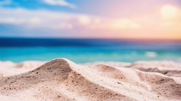 sand dune at the beach with a pink sunset in the background