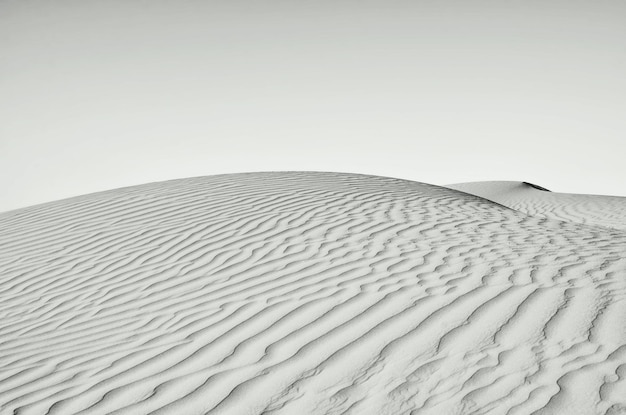 Photo sand dunes against clear sky