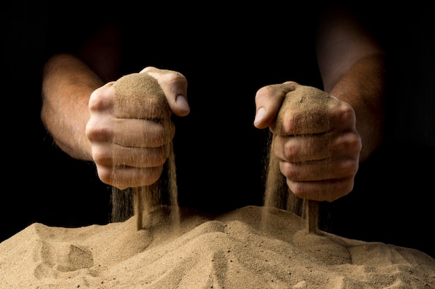 Sand fist on a black background