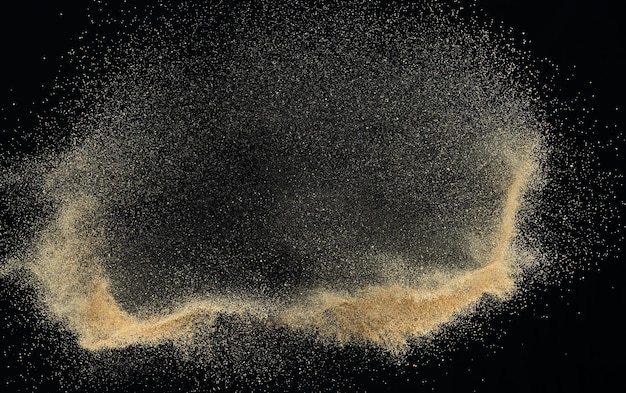 Sand flying explosion Golden sand wave explode Abstract sands cloud fly Yellow colored sand