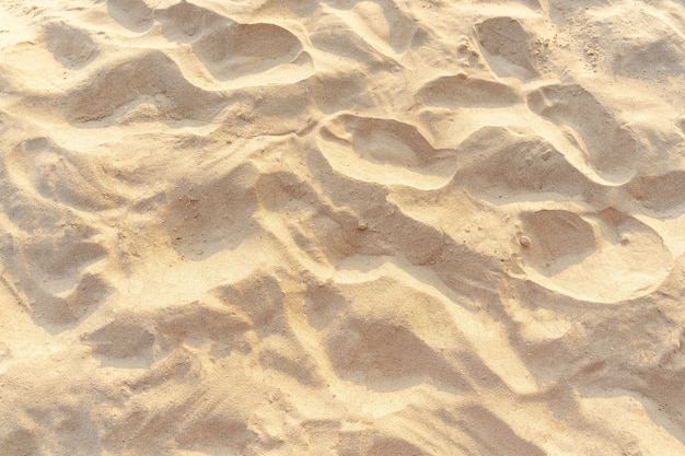 Sand pattern texture in tropical beach as background. Outdoor beach in summer.