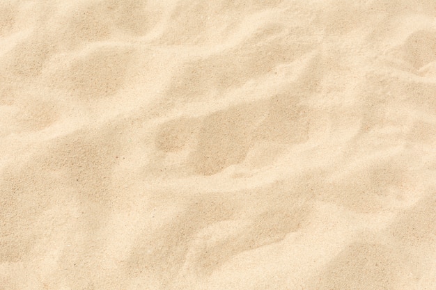 Photo sand smooth texture on the beach