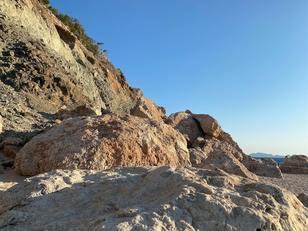 Sand stonelarge sandy rock in autumn at sunset