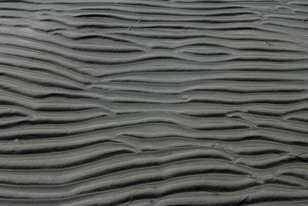 Sand surface after low tide - sand beach pattern