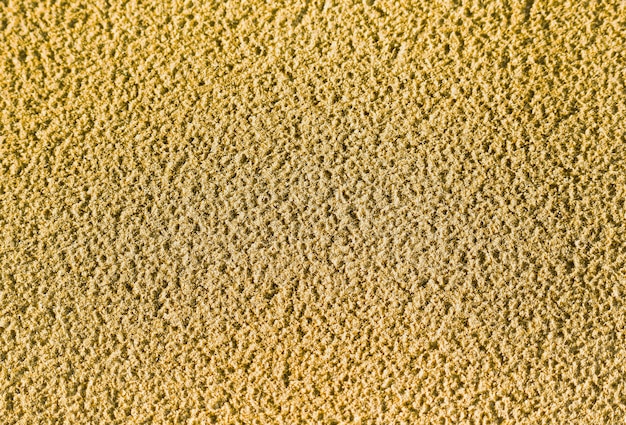 The sand texture background with a surface rough of the tropical beach in Thailand