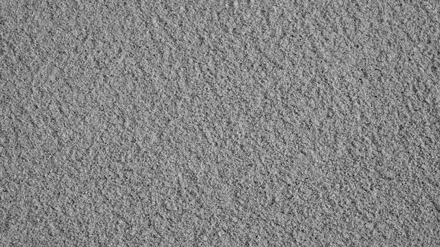 砂の質感 灰色または明るい灰色の砂の質量
