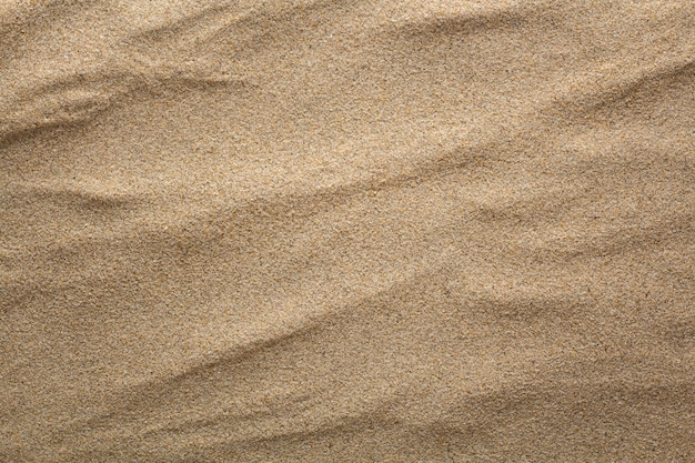 The sand textured background. Flat lay top view.