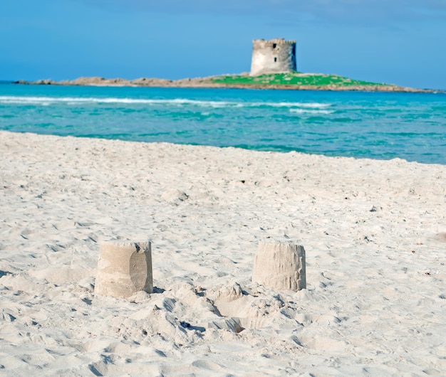 Sand towers with Aragonese tower in the background