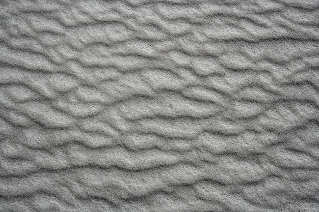 sand waves testure on white sands like desert 