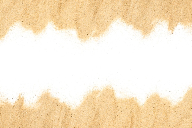 Foto sabbia su uno sfondo bianco a forma di spiaggia in una vista dall'alto