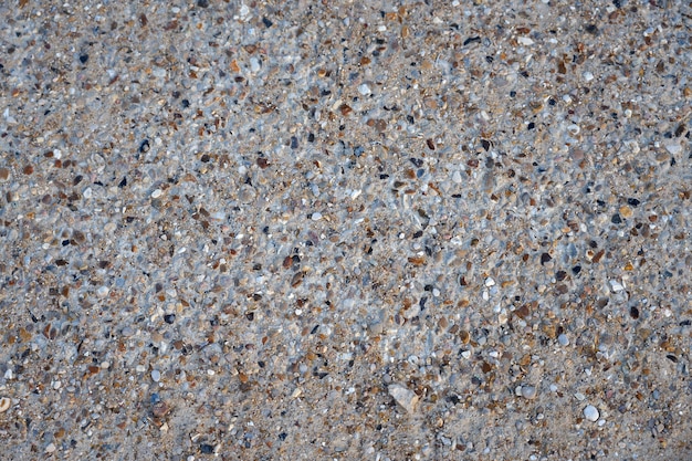 Sand with small stones background.