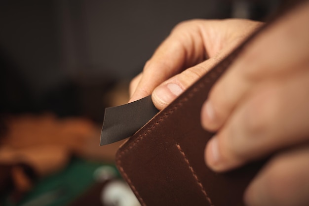 sandpaper tanner makes leather wallet professional craftsman business handiwork