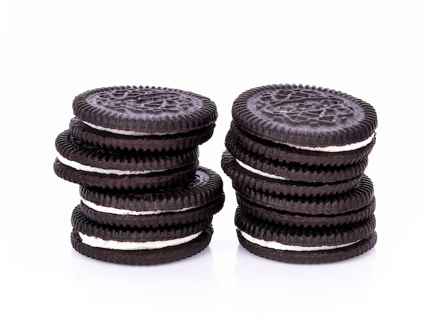 Sandwich cookies with cream on white background