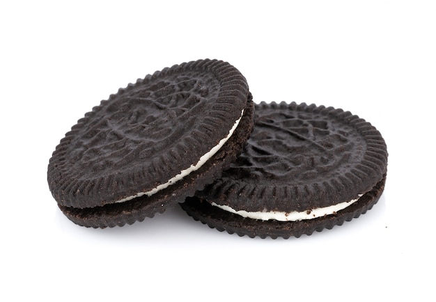 Sandwich cookies with cream on white background