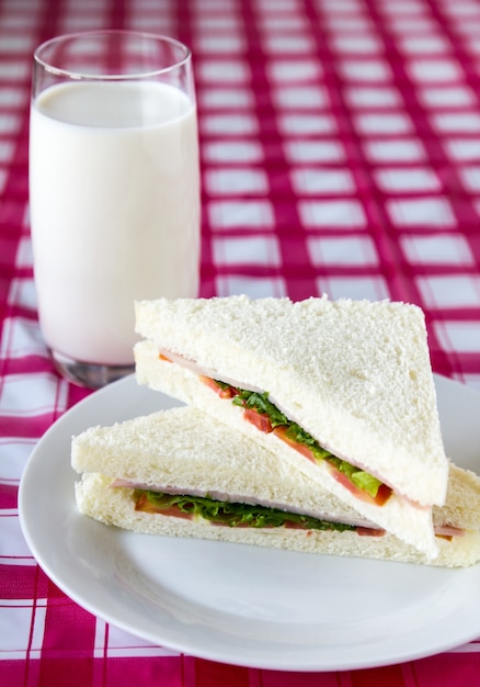 Sandwich and milk glass.